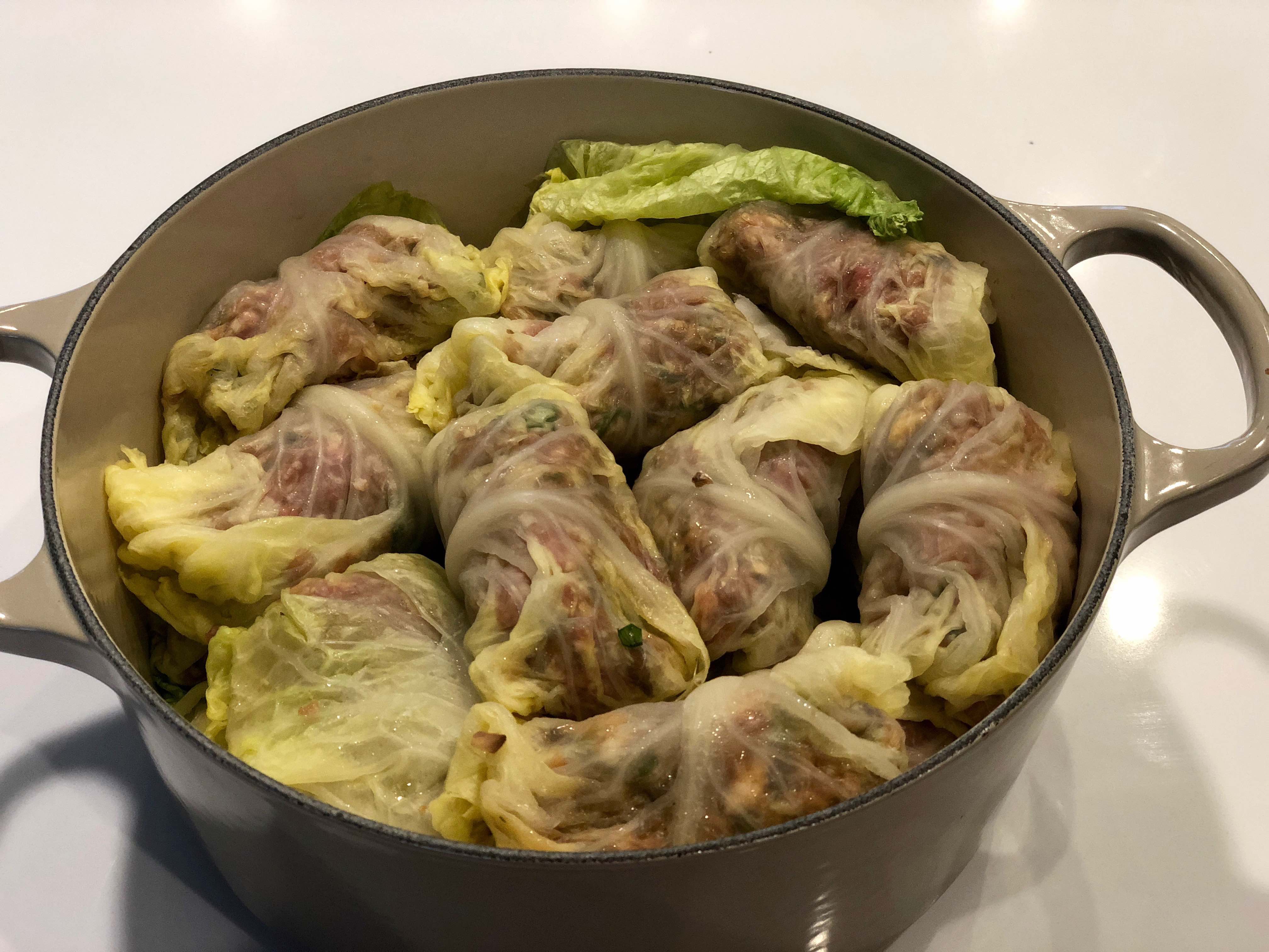 Mouthwatering stuffed cabbage roll recipe with a luscious sweet and sour sauce. It bakes in one pot so cleanup is a breeze. | grownupdish.com