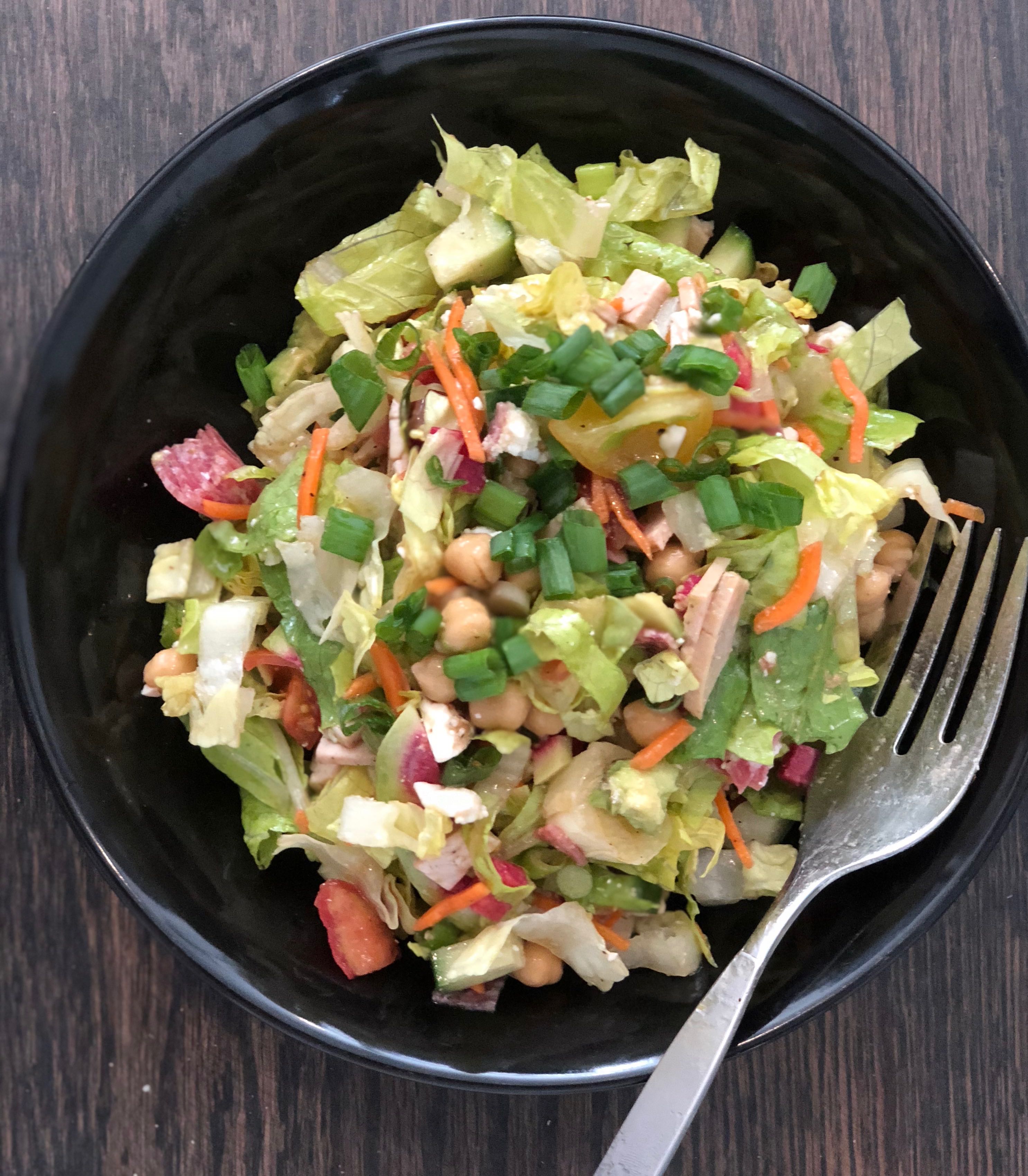 This savory Italian chopped salad recipe comes together in 10 minutes. It can be made Paleo, keto, vegetarian or Whole30 compliant by varying the ingredients. | grownupdish.com