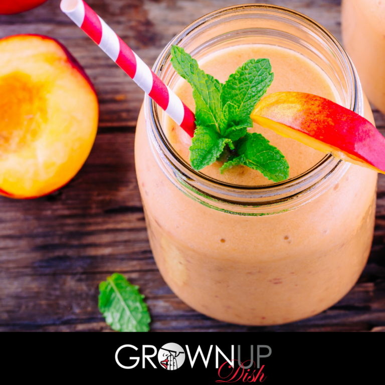 This Peach Basil Smoothie recipe is rich, sweet, fruity and creamy (even though it contains no dairy or sweeteners.) The best part? The healthy Fab Four combination of protein, fat, fiber and greens will elongate your blood sugar curve and keep you full for hours. | www.grownupdish.com
