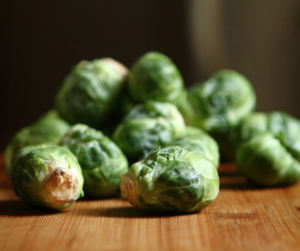 These healthy and easy Crock-Pot Brussels Sprouts have three ingredients and they come out perfectly every time.  They're sugar-free, gluten-free, paleo, vegan and Whole30. | www.grownupdish.com