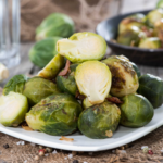 Healthy Crock-Pot Brussels Sprouts have three ingredients and they come out perfectly every time.  They're sugar-free, gluten-free, paleo, vegan and Whole30. | www.grownupdish.com