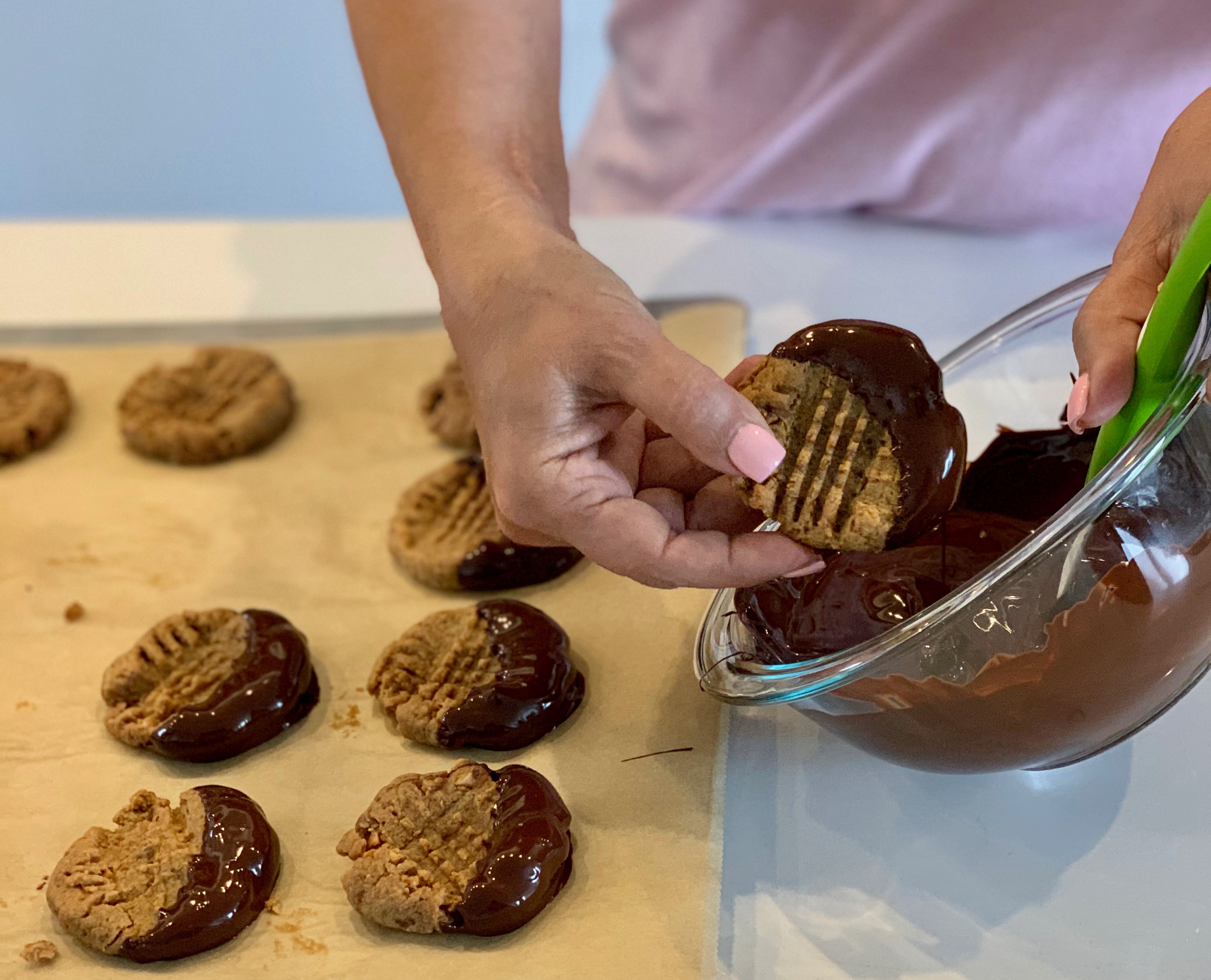 Chocolate dipped gluten-free peanut butter cookies so delicious you won't believe they are healthy (and easy to make!) No sugar, flour or dairy. | www.grownupdish.com