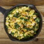 Creamy scrambled eggs with arugula and Parmesean are lovely and quick to prepare. Easy enough for a weekday morning and elegant enough for a special brunch. | www.grownupdish.com