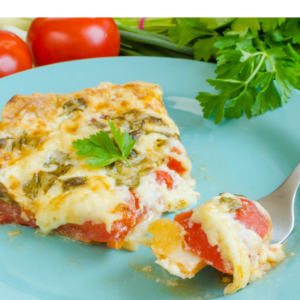 Make a quick and easy southern tomato pie. Tuck ripe tomatoes into a buttery pie crust and top with a layer of melty cheese. It's delicious! | www.grownupdish.com