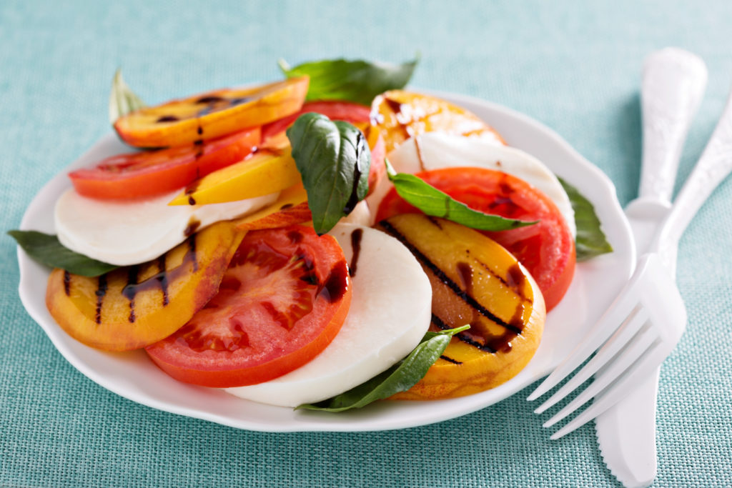 There's a saying that goes "What grows together, goes together." With peaches and tomatoes in season and plentiful, this super simple Peach and Tomato Caprese Salad is a lovely way to enjoy them. Just four ingredients and it's on the table in minutes. | www.grownupdish.com