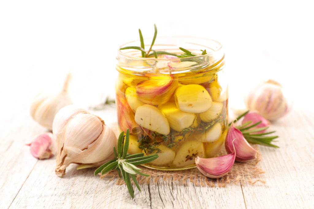 The benefits of using garlic go beyond a little flavor. Instead of sprinkling a dash of garlic salt, try a healthy garlic recipe: Fire Cider or Garlic Confit | www.grownupdish.com