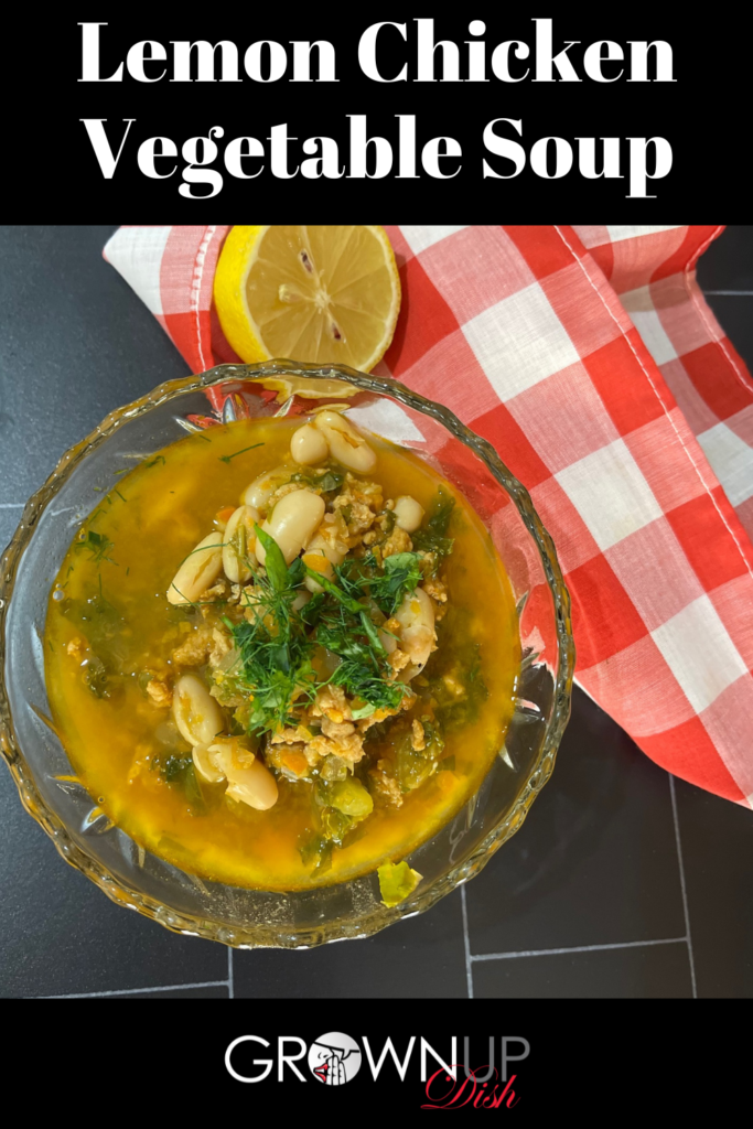 This Lemon Chicken Vegetable Soup is packed with greens and beans and is oh so delicious. You can make it one pot and it freezes beautifully! | www.grownupdish.com
