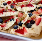 Creamy frozen yogurt bark is a protein-packed treat everyone will love. It's made with just a few ingredients & it's infinitely customizable. | www.grownupdish.com