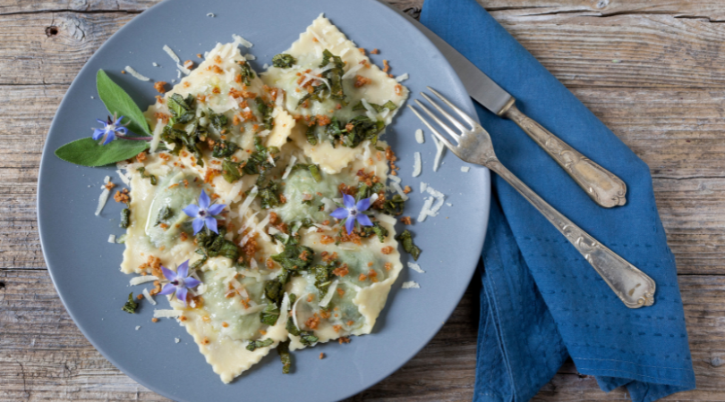 Creamy ravioli with spring vegetables is a delicious vegetarian recipe. It's a healthy easy meal packed with flavor and nutrients. | www.grownupdish.com