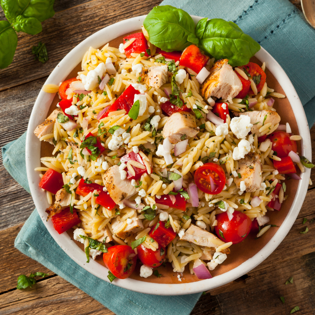 Savory Summer Pasta Salad is a delicous combination of cooked and raw vegetables, tender pasta, and tangy feta, brought together with a zesty dressing. It's ideal as a side dish, or top it with your favorite protein and turn it into a meal.